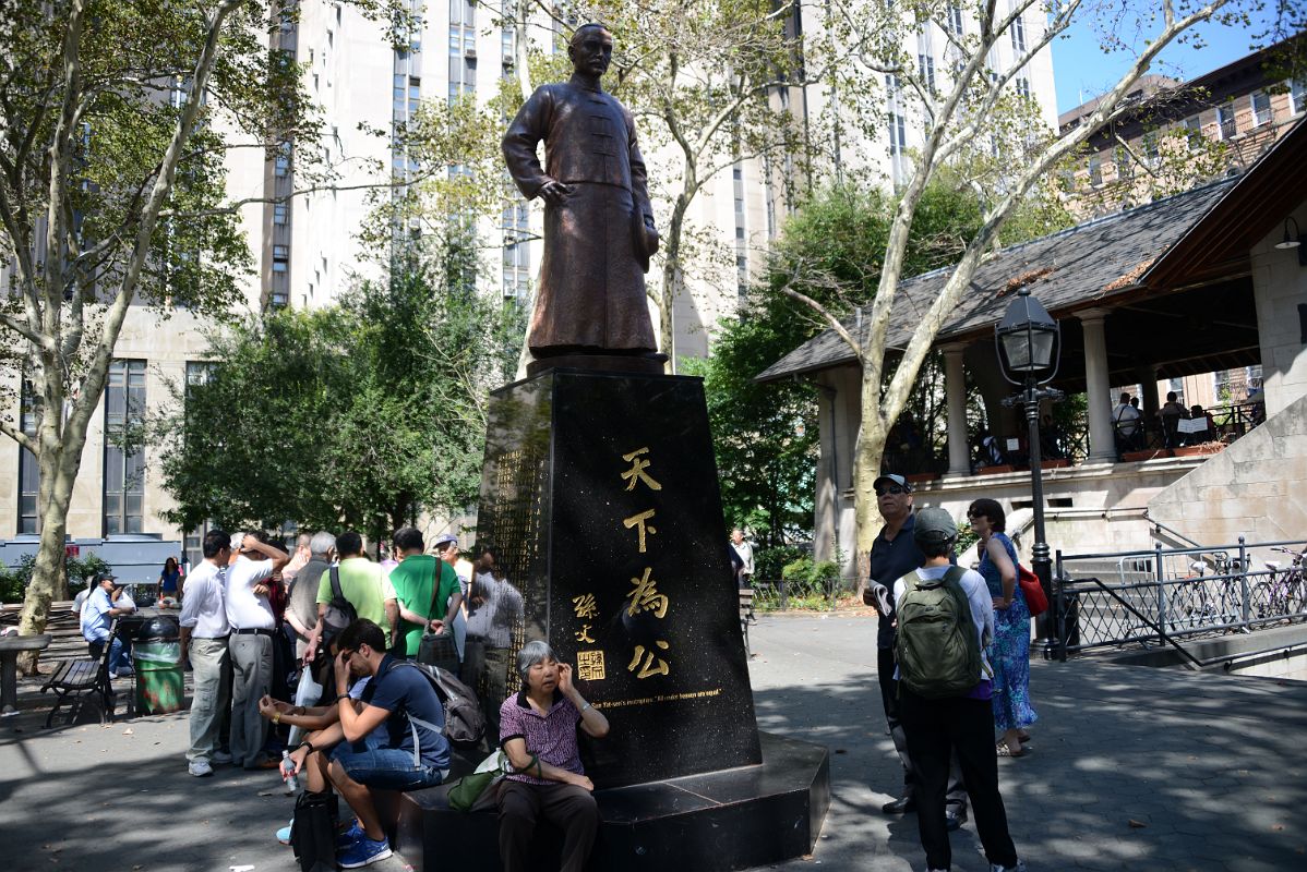 17-3 People Mill Around Sun Yat-Sen Statue In Columbus Park Where Local Chinese Meet And Play Mahjong In Chinatown New York City